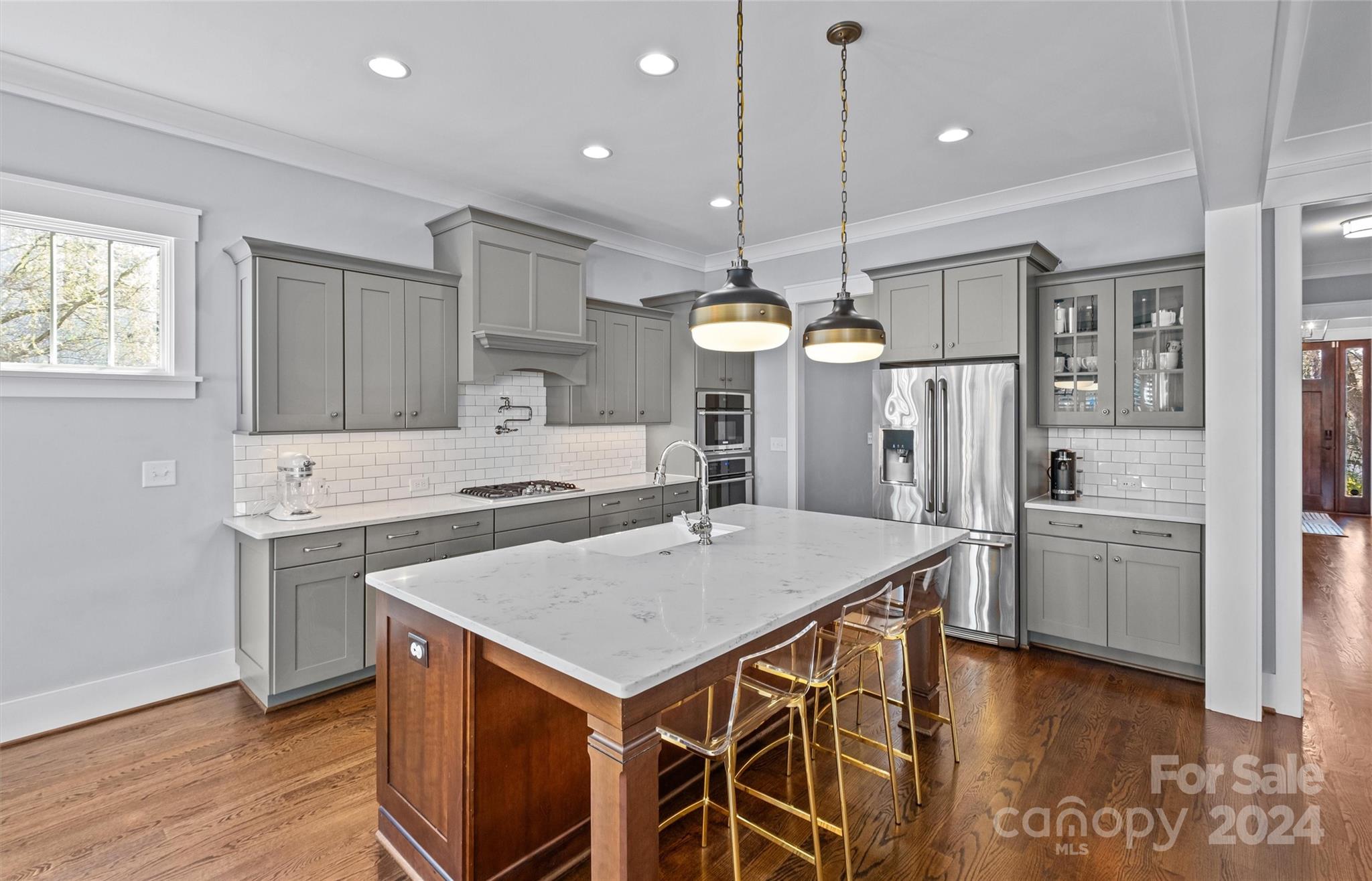 149 McAlway Road Charlotte, NC 28211 - Photo 12 of 48 a kitchen with a table and chairs in it