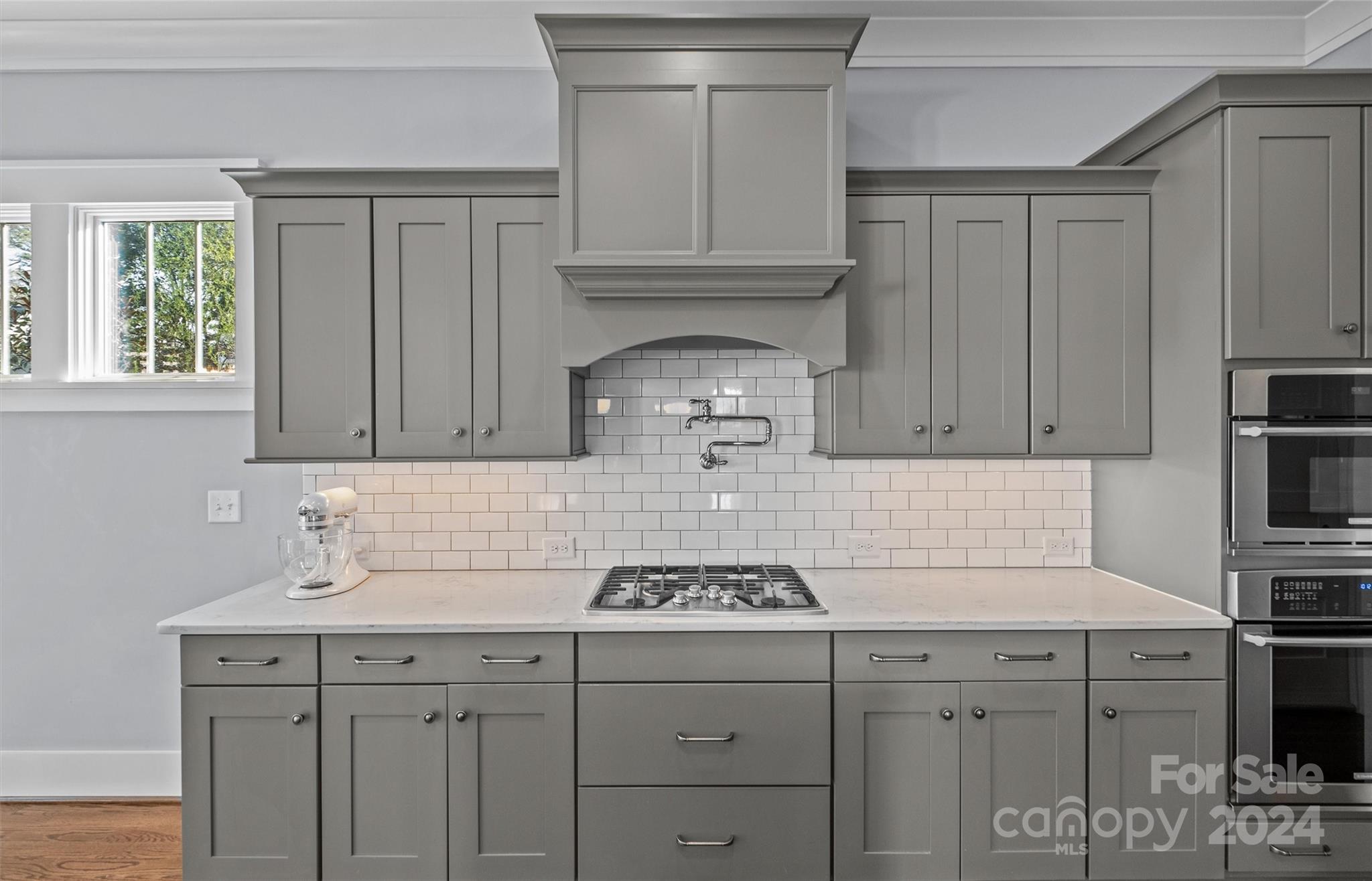 149 McAlway Road Charlotte, NC 28211 - Photo 15 of 48 a kitchen with stainless steel appliances granite countertop a sink stove and cabinets