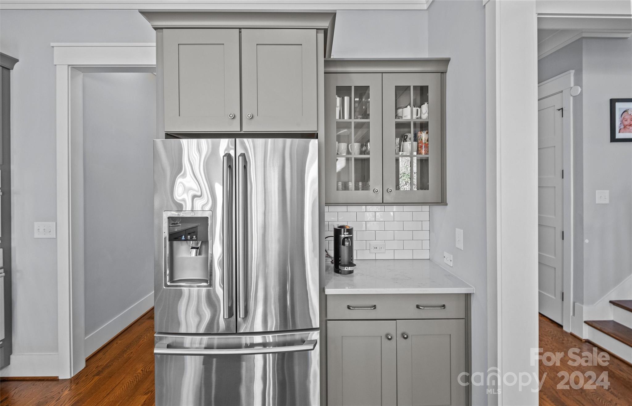 149 McAlway Road Charlotte, NC 28211 - Photo 18 of 48 a white refrigerator freezer and a stove sitting inside of a kitchen