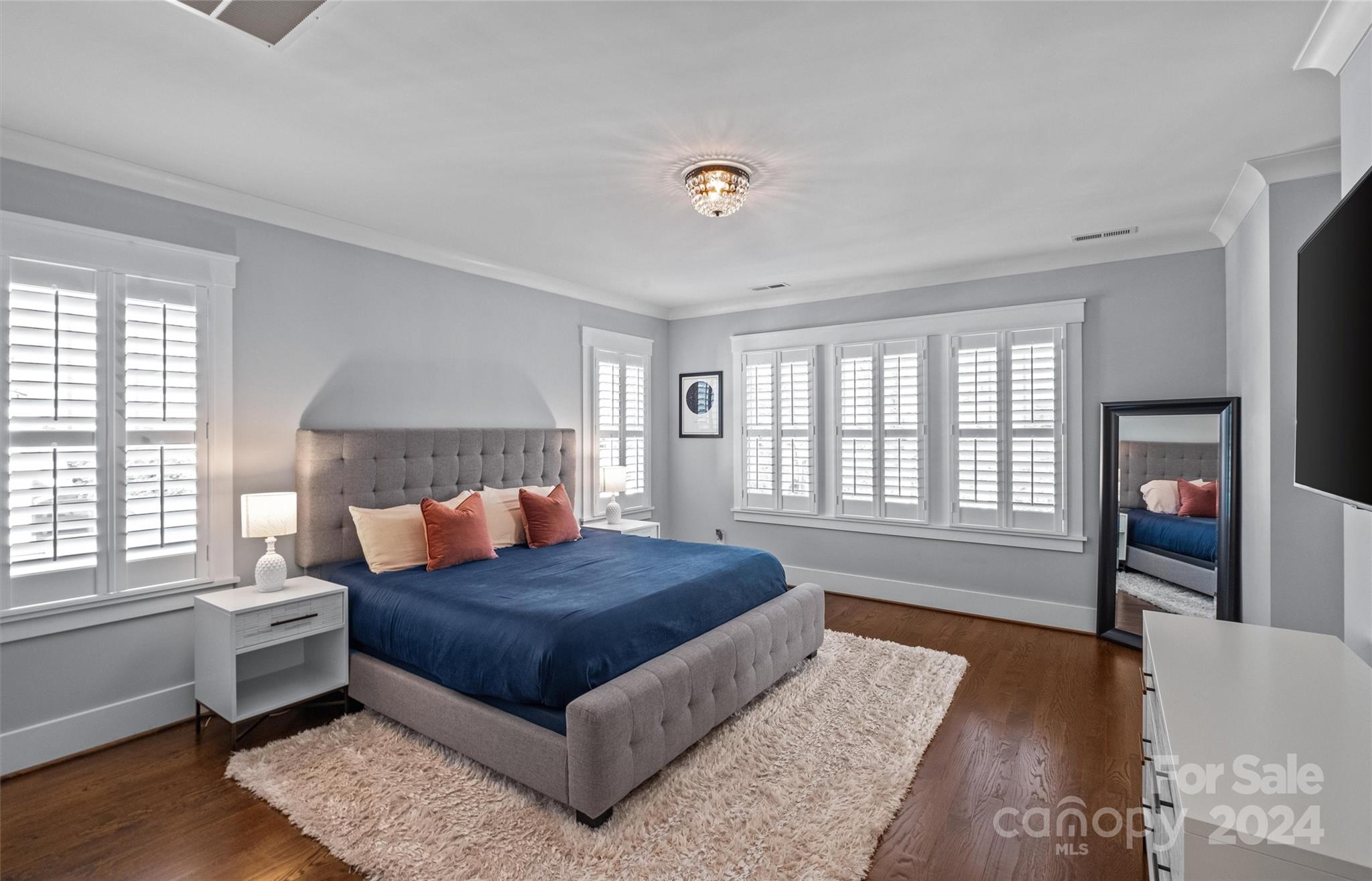 149 McAlway Road Charlotte, NC 28211 - Photo 23 of 48 a bedroom with a large bed and a couch