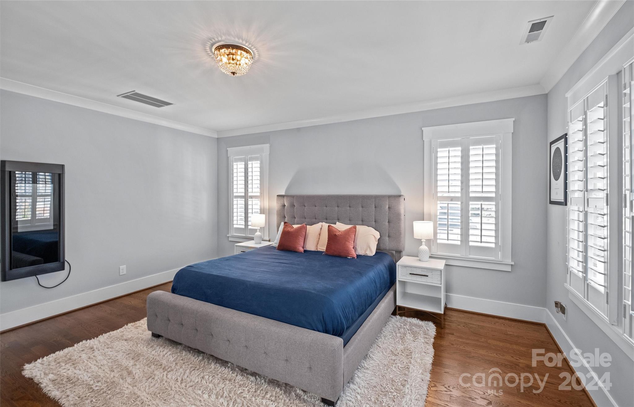 149 McAlway Road Charlotte, NC 28211 - Photo 24 of 48 a bedroom with a bed and a window