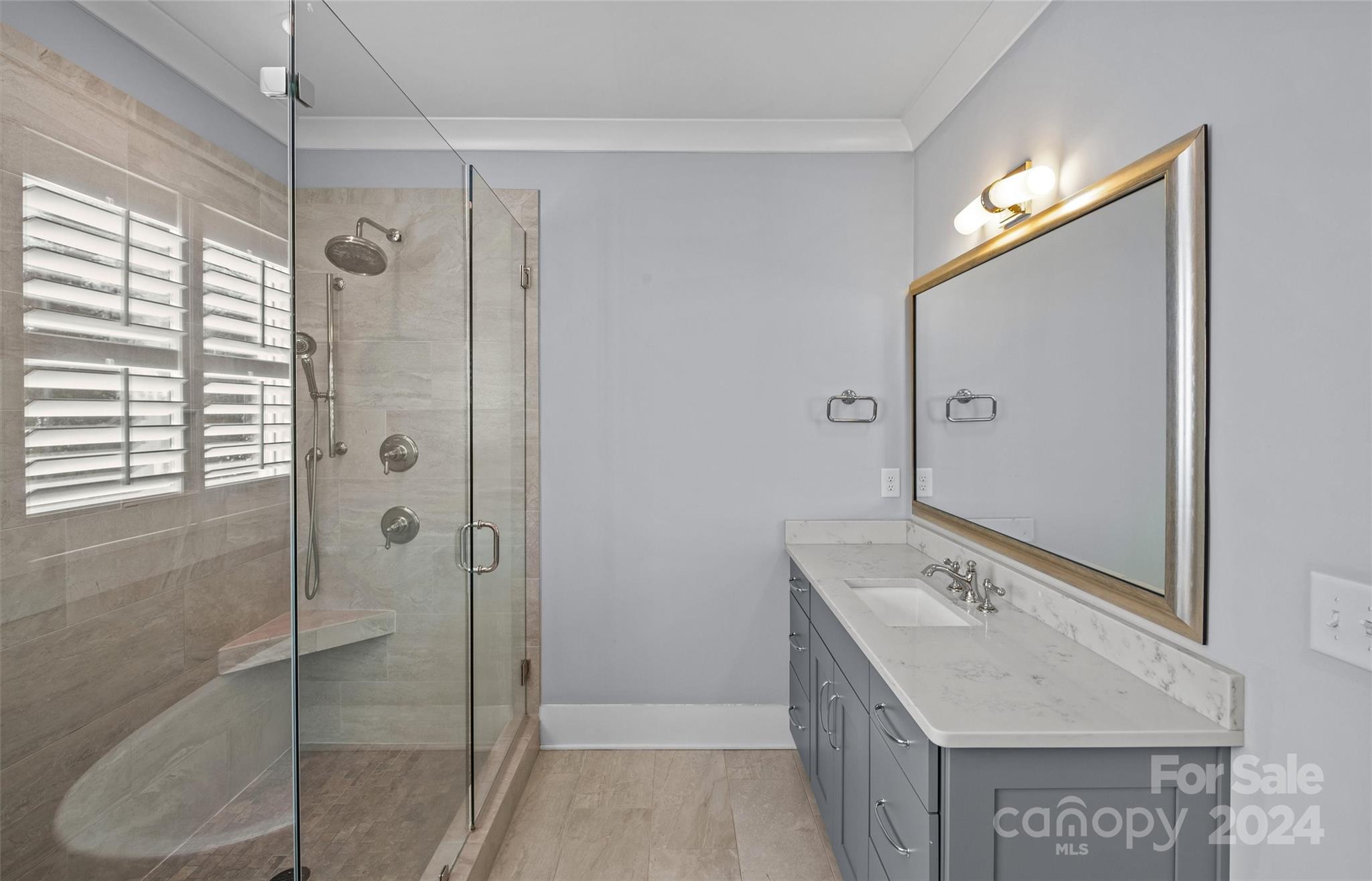 149 McAlway Road Charlotte, NC 28211 - Photo 26 of 48 a bathroom with a granite countertop sink mirror and shower