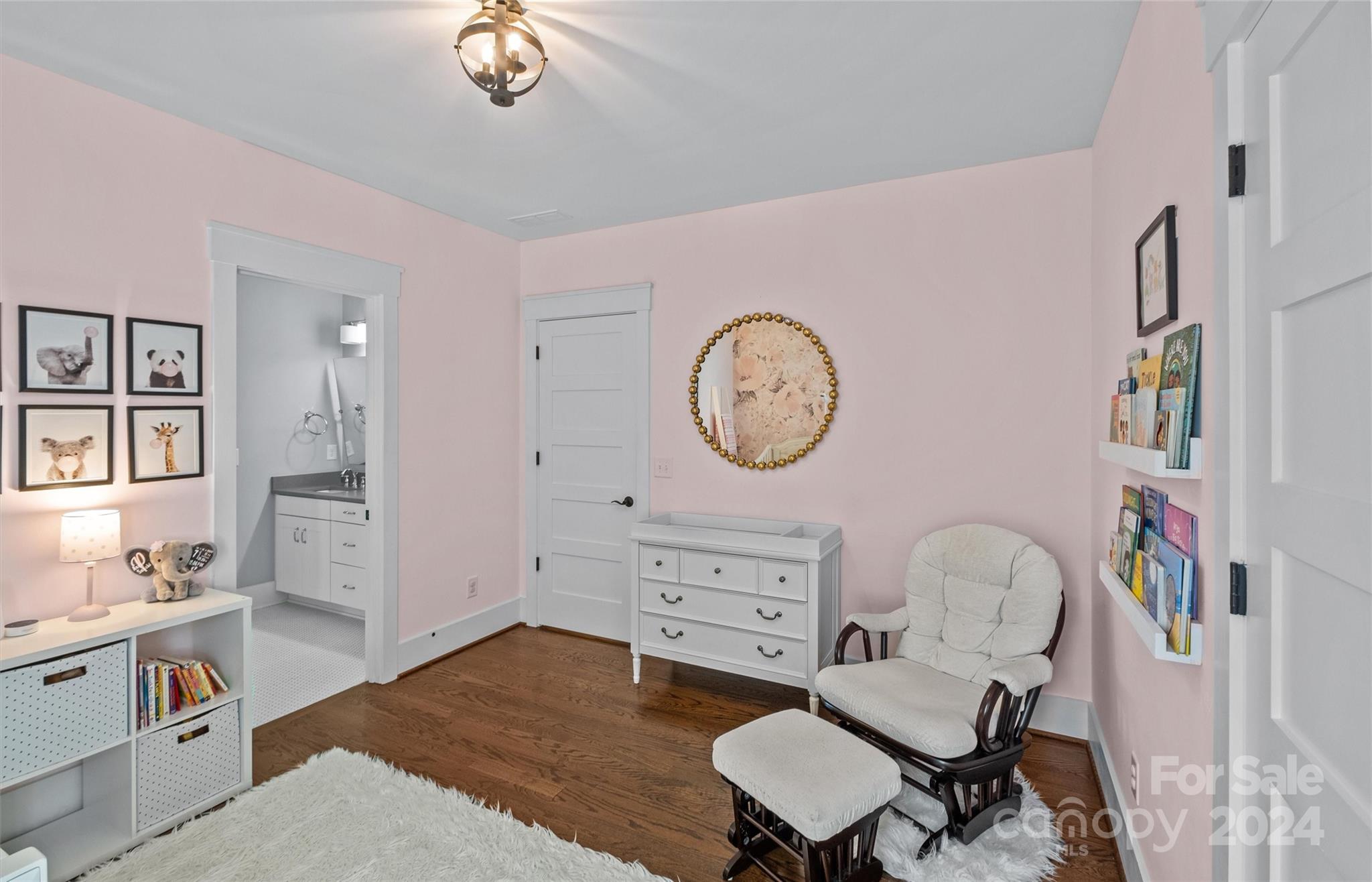 149 McAlway Road Charlotte, NC 28211 - Photo 30 of 48 a living room with furniture a clock on wall and a table