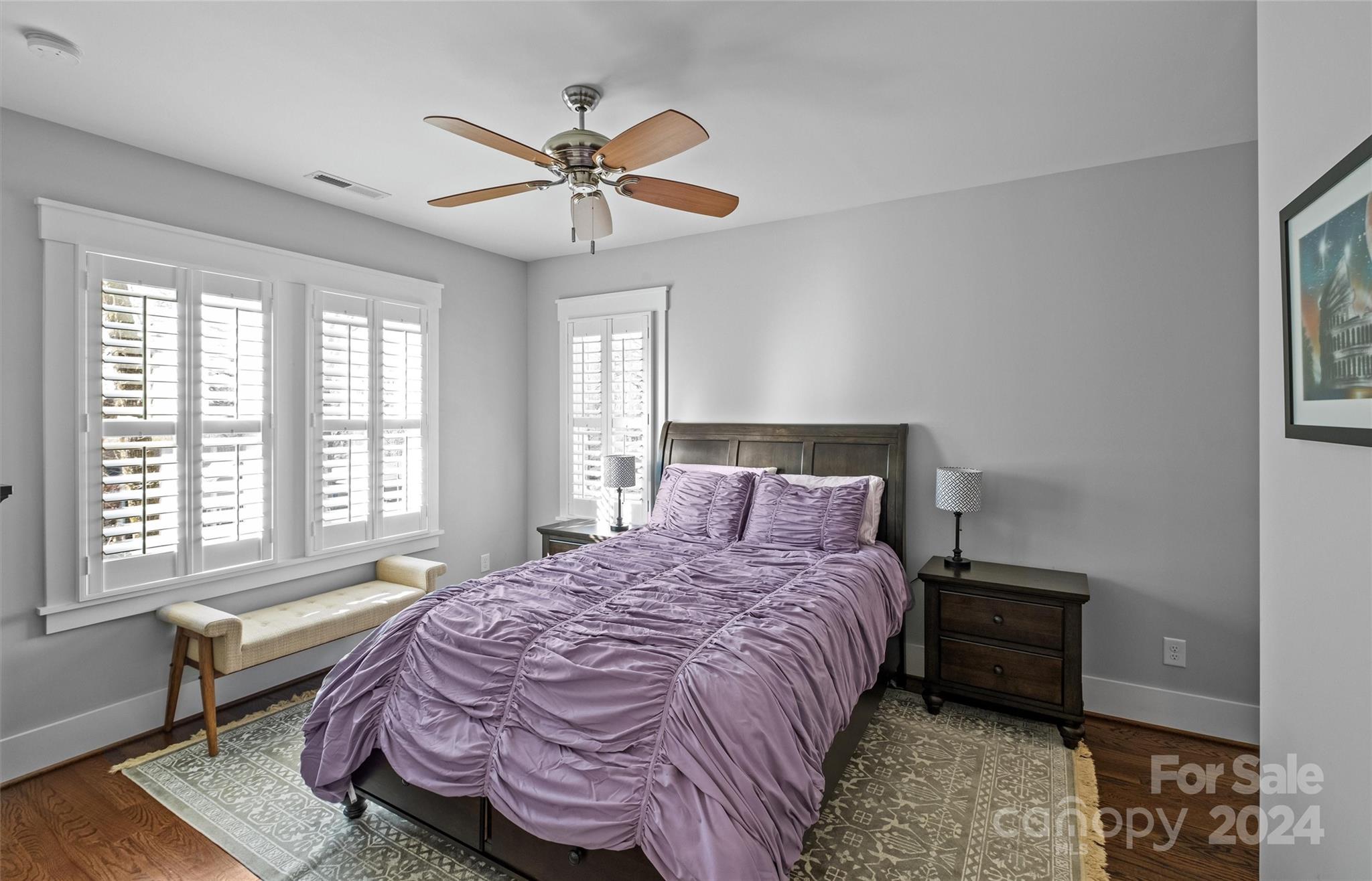 149 McAlway Road Charlotte, NC 28211 - Photo 34 of 48 a bedroom with a bed a chandelier and a window