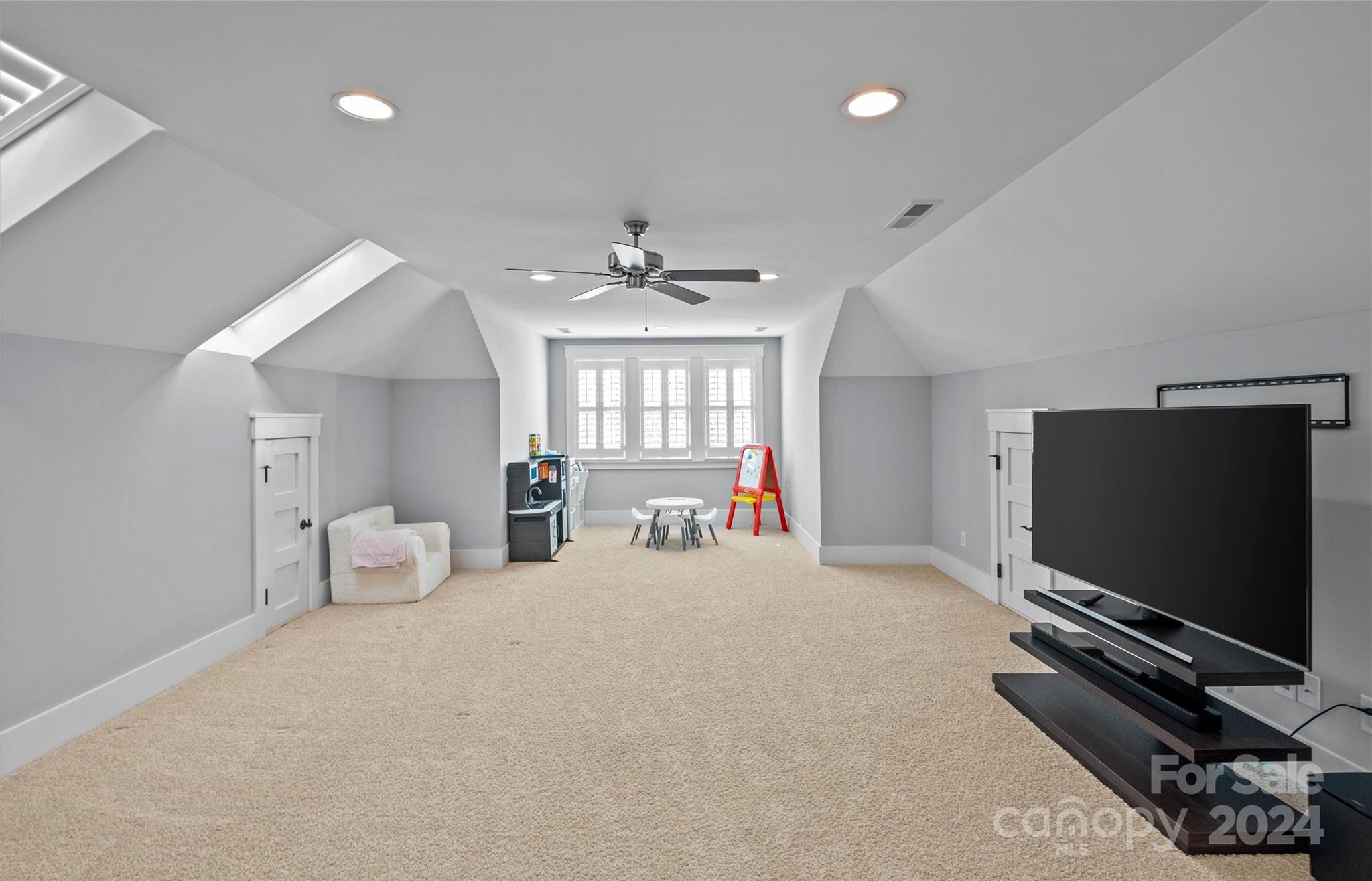 149 McAlway Road Charlotte, NC 28211 - Photo 38 of 48 a room with furniture and a flat screen tv