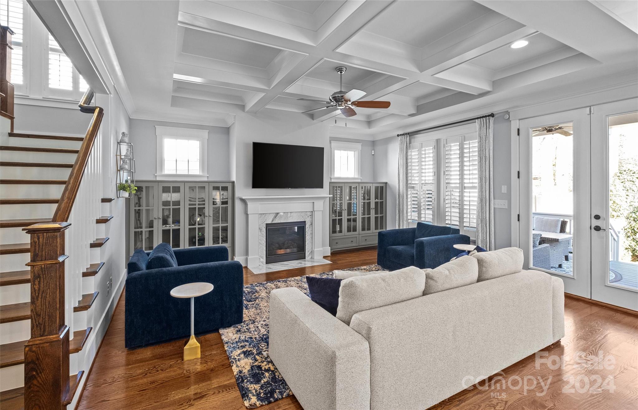 149 McAlway Road Charlotte, NC 28211 - Photo 7 of 48 a living room with furniture a fireplace and a flat screen tv