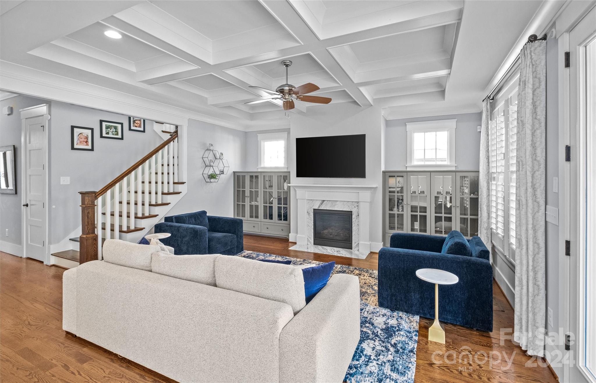 149 McAlway Road Charlotte, NC 28211 - Photo 8 of 48 a living room with furniture a fireplace and a flat screen tv