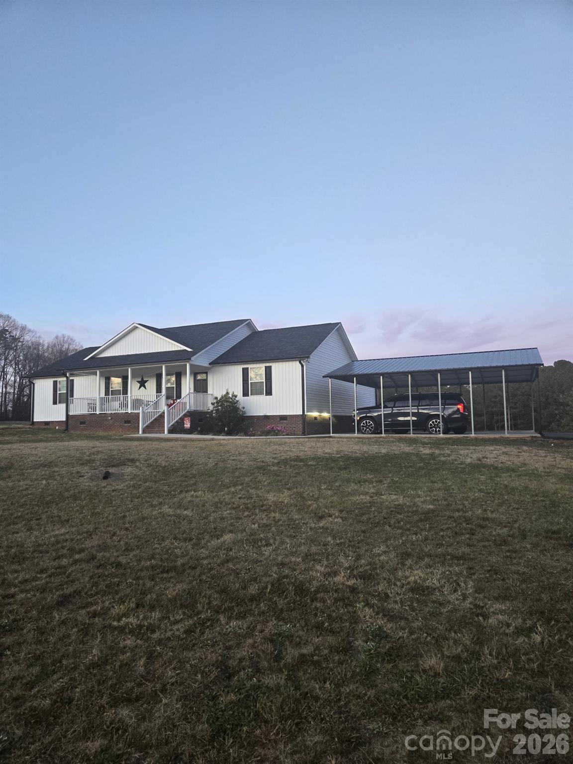 147 Black Bottom Road Union, SC 29379 - Photo 23 of 23 a front view of a house with a garden
