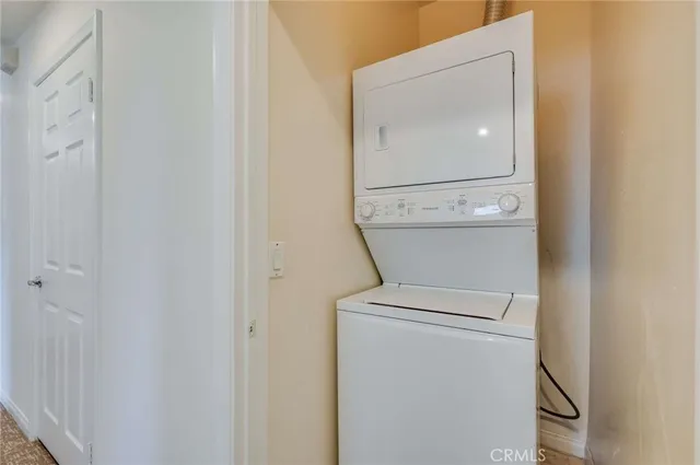 a close view of a utility room with a washer and dryer