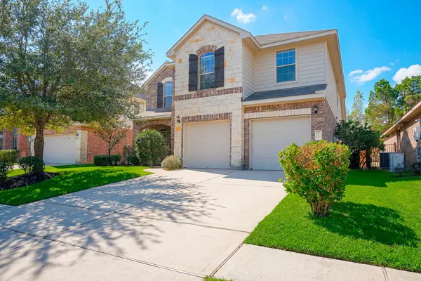 a house view with a garden space
