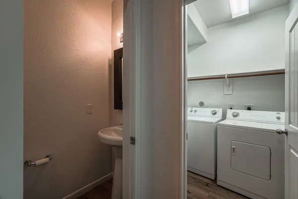 a utility room with dryer and washer