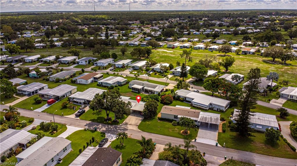 4 Chateau Way Naples, FL 34112 - Photo 19 of 21 an aerial view of residential houses with outdoor space