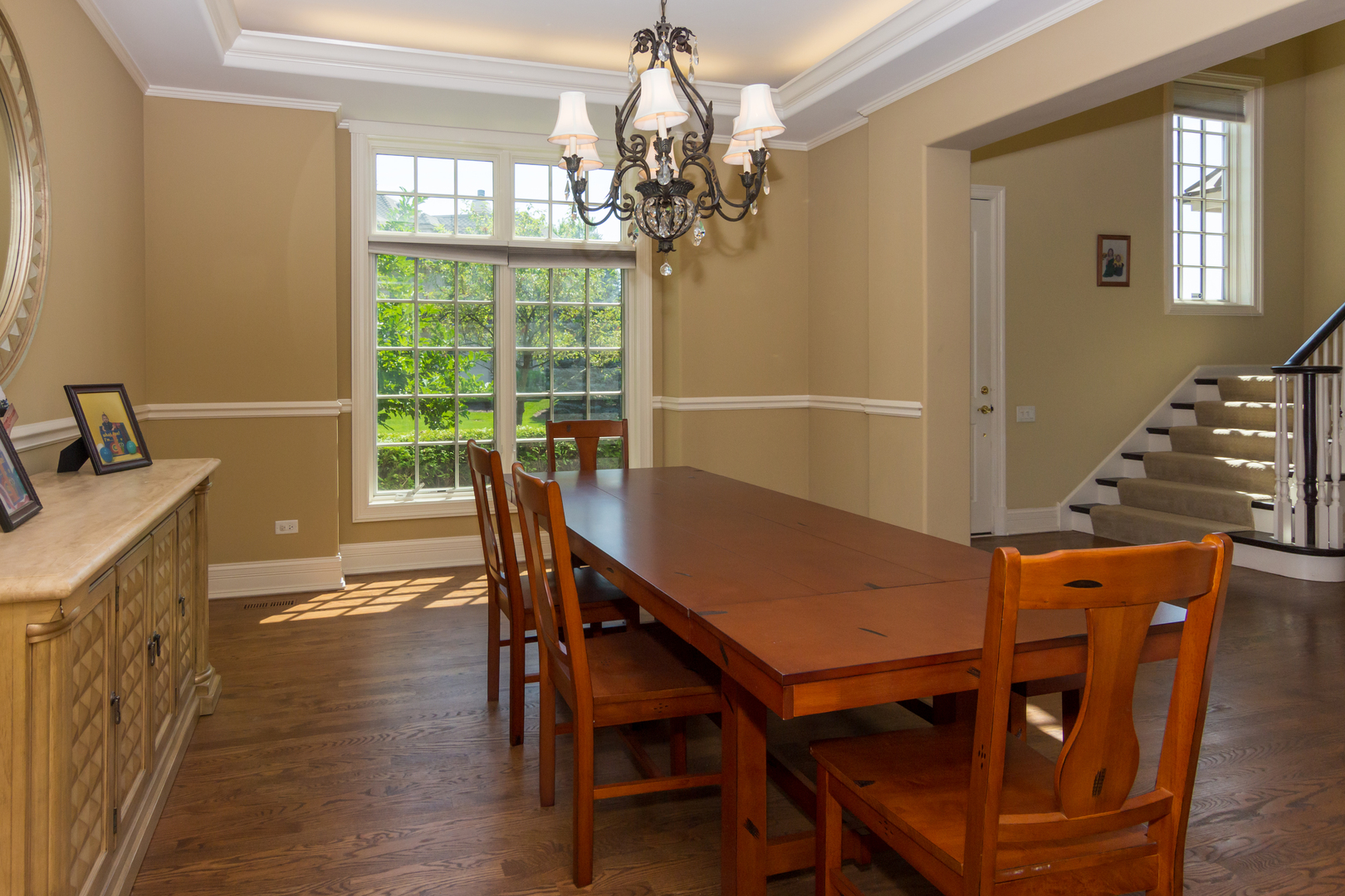 26 Willowcrest Drive Oak Brook, IL 60523 - Photo 2 of 17 a view of a dining room with furniture window and wooden floor