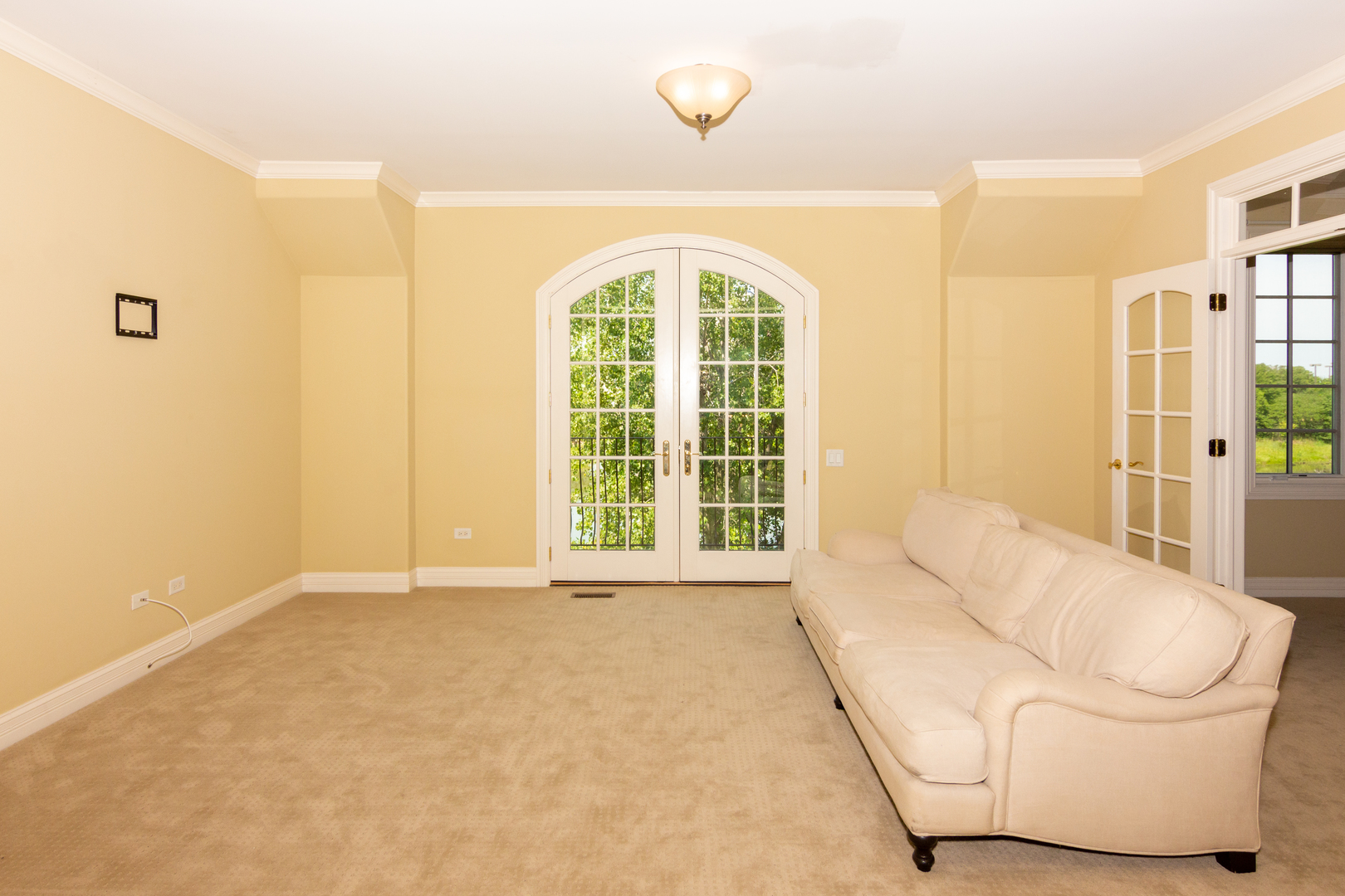 26 Willowcrest Drive Oak Brook, IL 60523 - Photo 9 of 17 a spacious bedroom with a bed and a large window