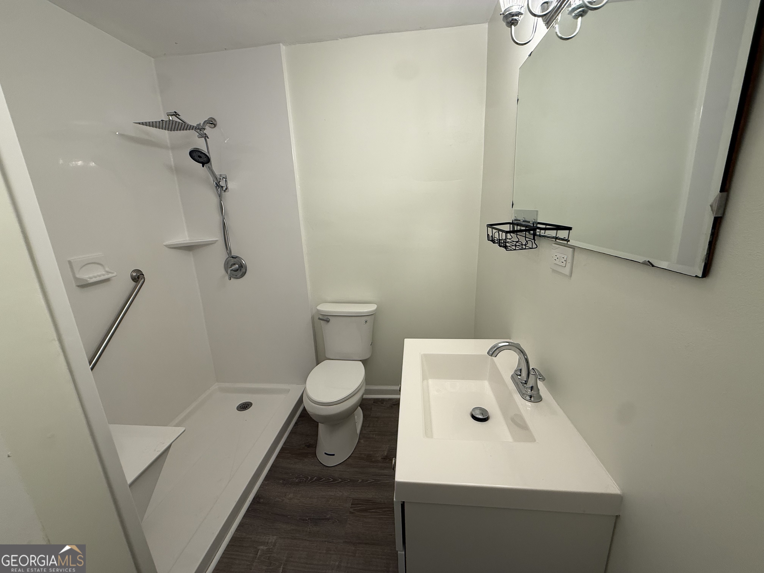 108 Plum Street Dublin, GA 31021 - Photo 15 of 33 a bathroom with a sink a toilet and shower