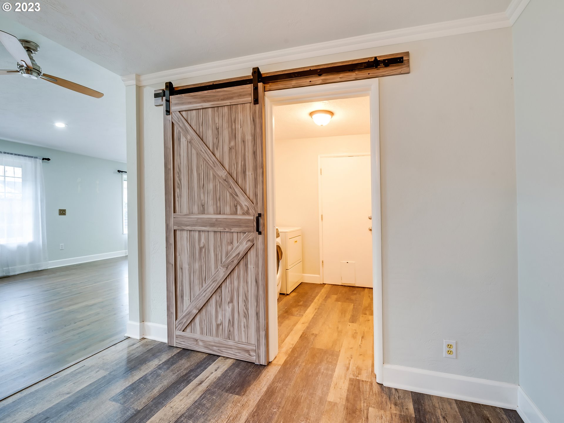 2552 Jasmine Street Eugene, OR 97404 - Photo 11 of 24 a view of a hallway with wooden floor and entryway