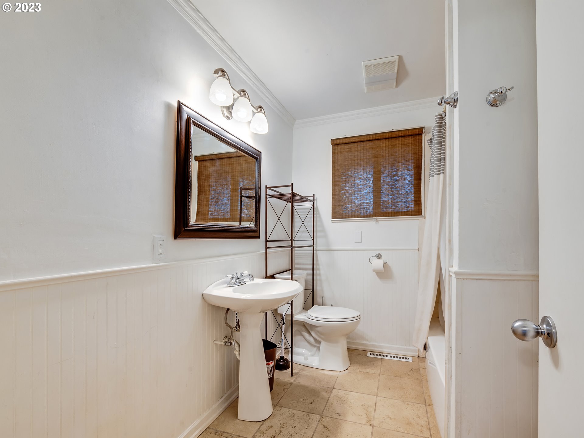 2552 Jasmine Street Eugene, OR 97404 - Photo 15 of 24 a bathroom with a toilet sink and mirror