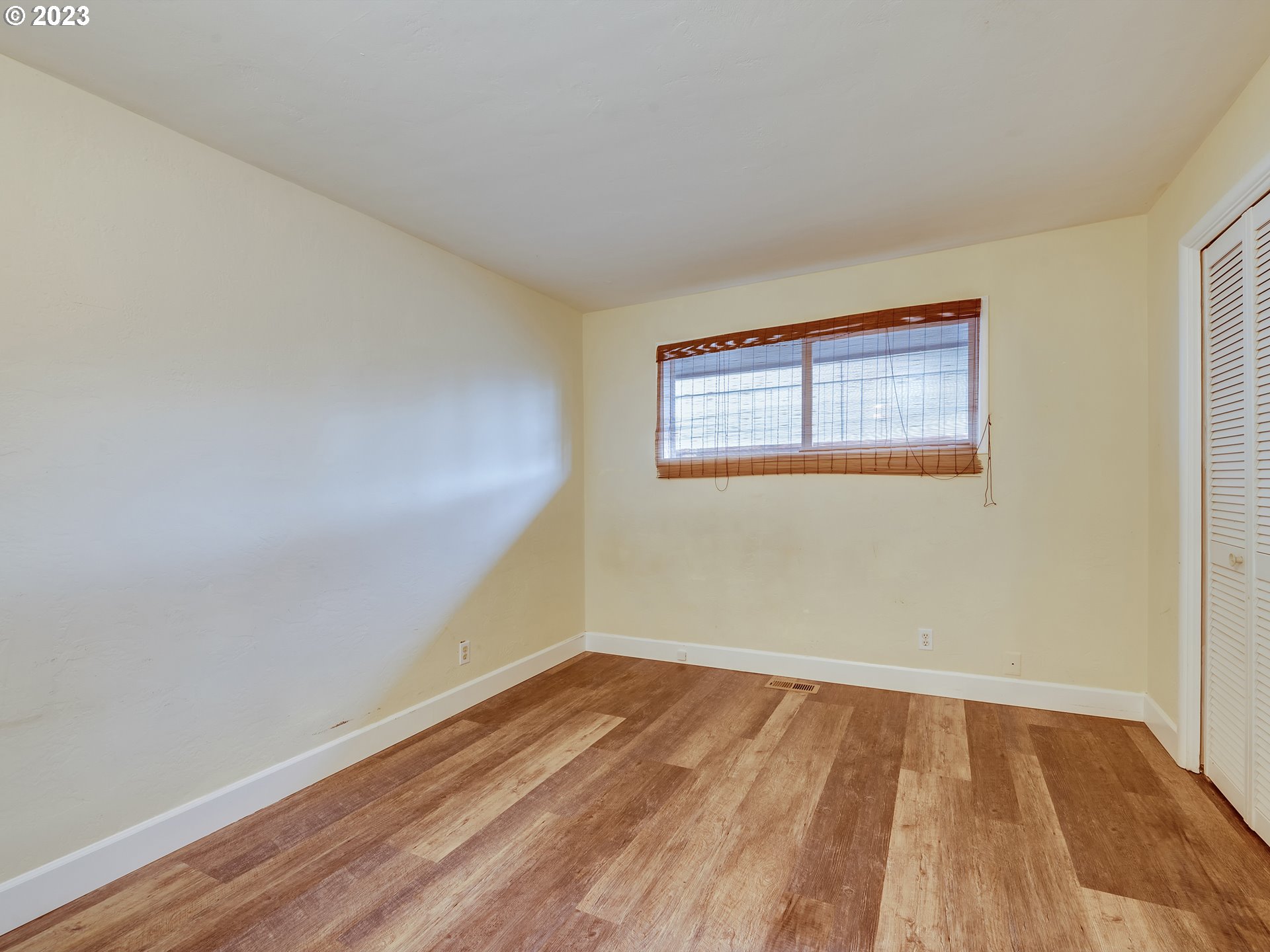 2552 Jasmine Street Eugene, OR 97404 - Photo 17 of 24 a view of empty room with wooden floor