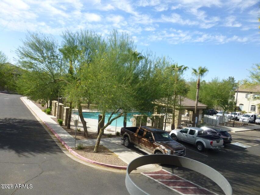 2727 North Price Road, Unit 28 Chandler, AZ 85224 - Photo 12 of 14 a view of a patio with swimming pool