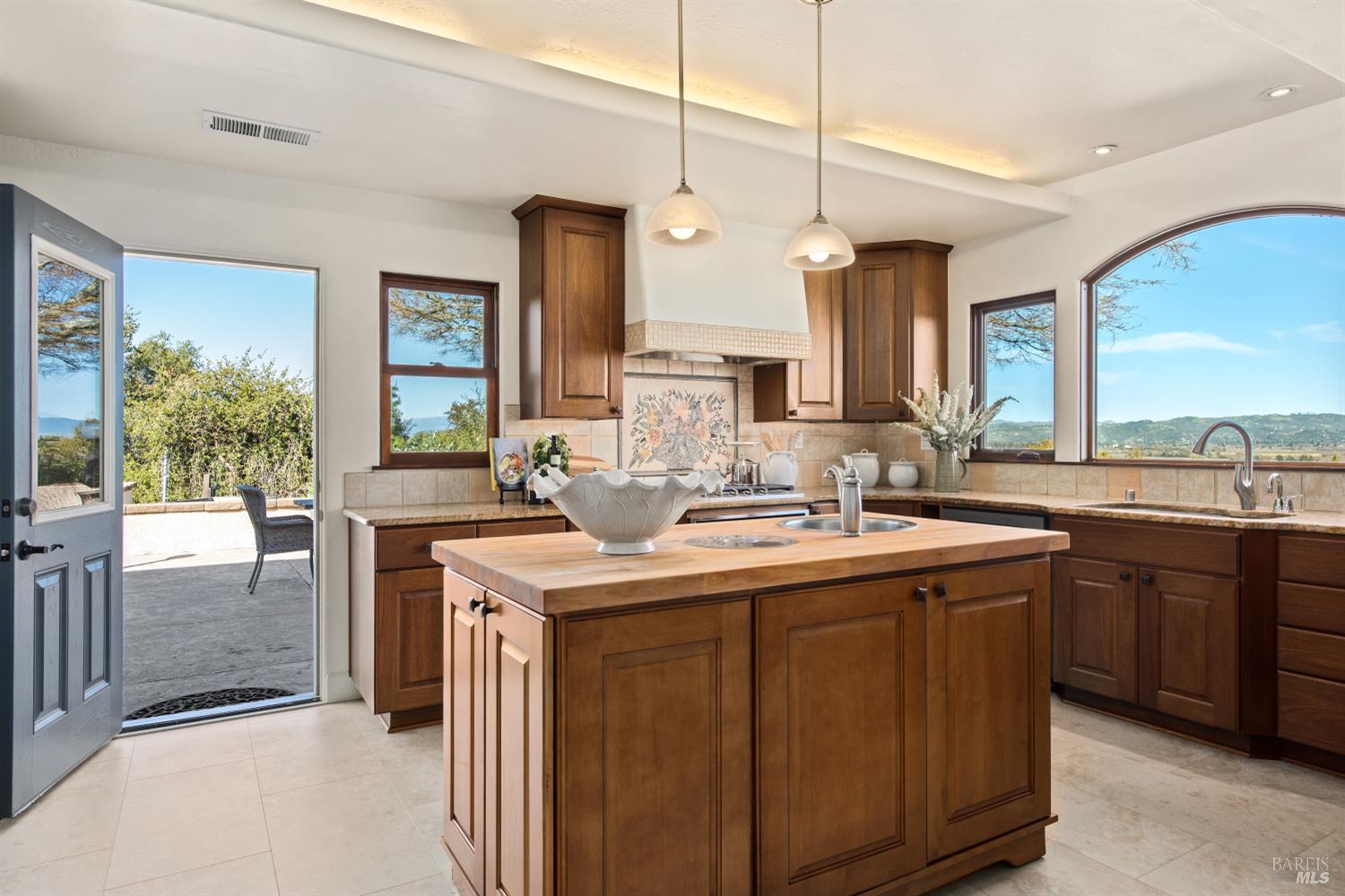 2405 Lewis Road Sebastopol, CA 95472 - Photo 20 of 58 a kitchen with a sink stove and cabinets