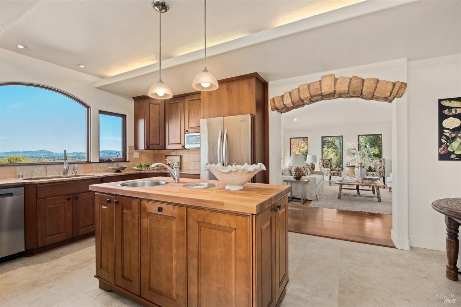 2405 Lewis Road Sebastopol, CA 95472 - Photo 21 of 58 a kitchen that has a lot of cabinets in it