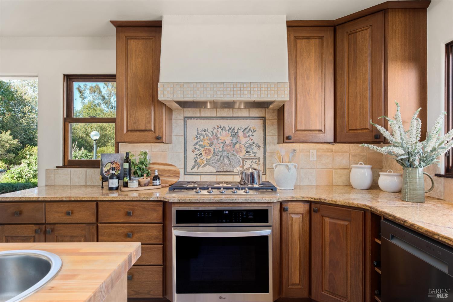 2405 Lewis Road Sebastopol, CA 95472 - Photo 23 of 58 a kitchen with a sink cabinets and window