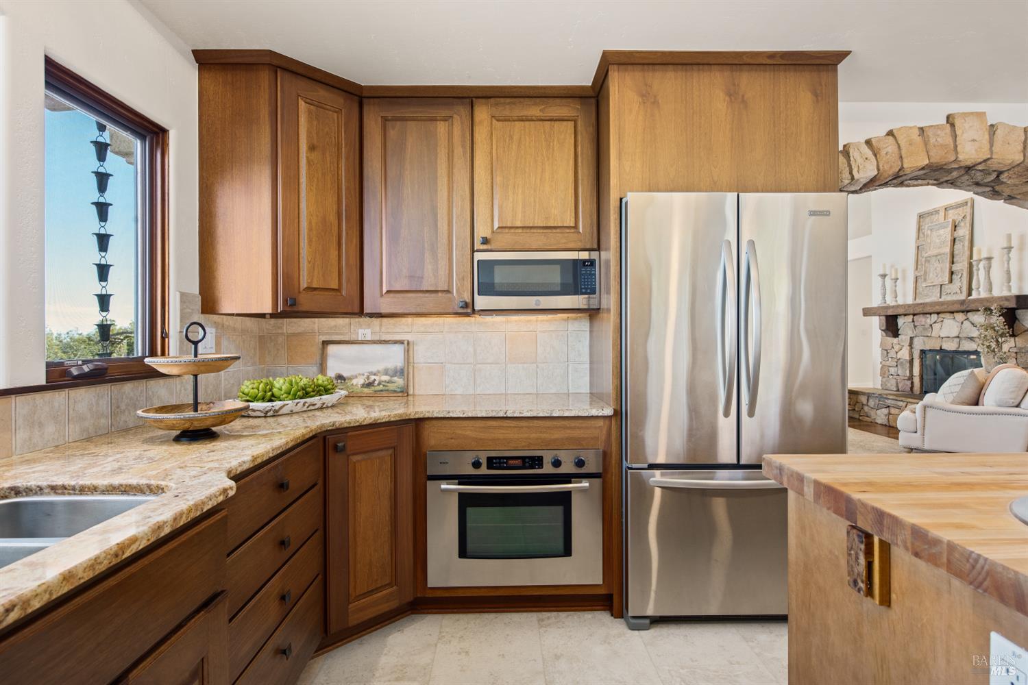 2405 Lewis Road Sebastopol, CA 95472 - Photo 24 of 58 a kitchen with a sink stove and refrigerator