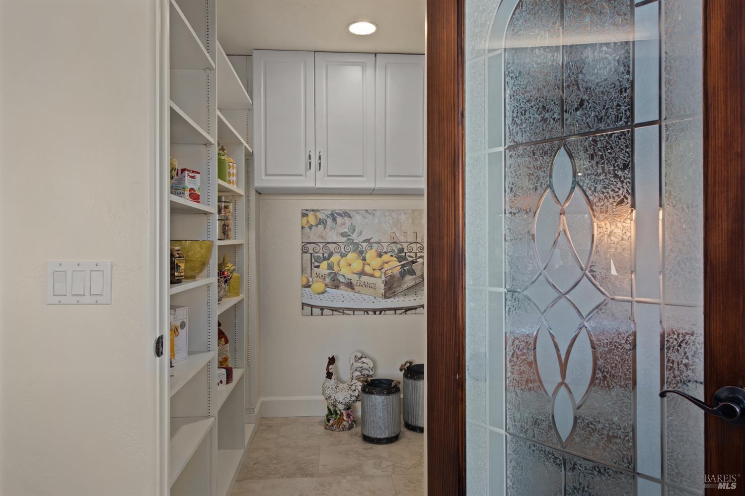2405 Lewis Road Sebastopol, CA 95472 - Photo 25 of 58 a hallway with painting on the wall and a shower