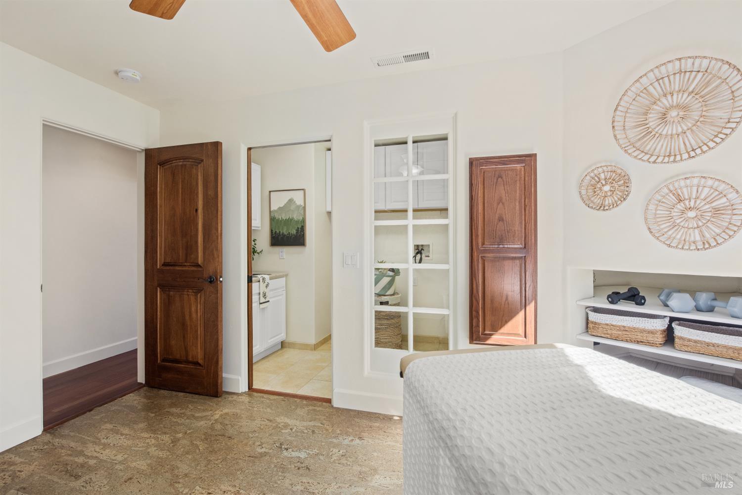 2405 Lewis Road Sebastopol, CA 95472 - Photo 31 of 58 a bedroom with a bed and a cabinets