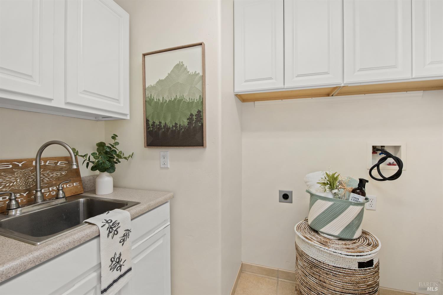 2405 Lewis Road Sebastopol, CA 95472 - Photo 32 of 58 a kitchen with granite countertop a sink a stove and cabinets