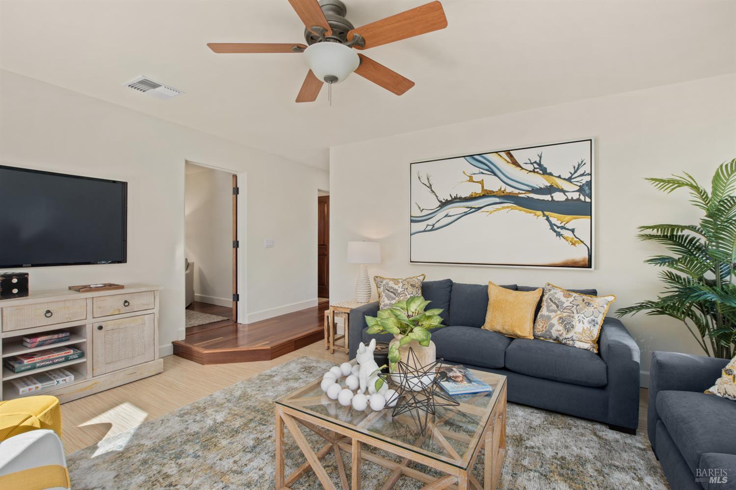 2405 Lewis Road Sebastopol, CA 95472 - Photo 35 of 58 a living room with furniture and a flat screen tv