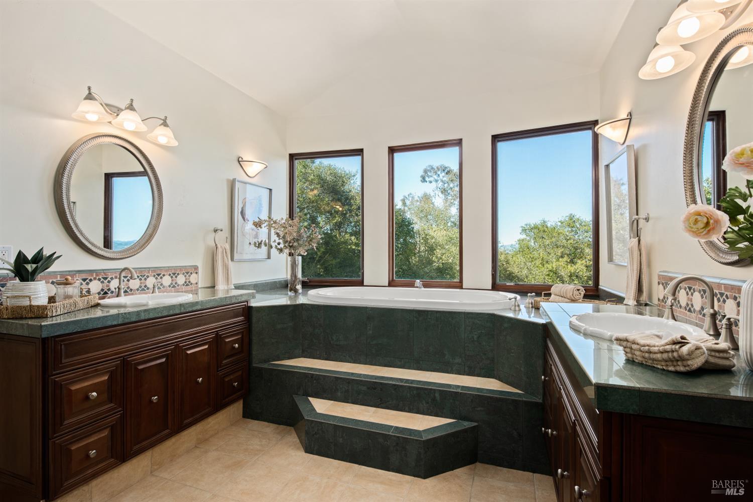 2405 Lewis Road Sebastopol, CA 95472 - Photo 46 of 58 a bathroom with a bathtub sink mirror vanity and toilet
