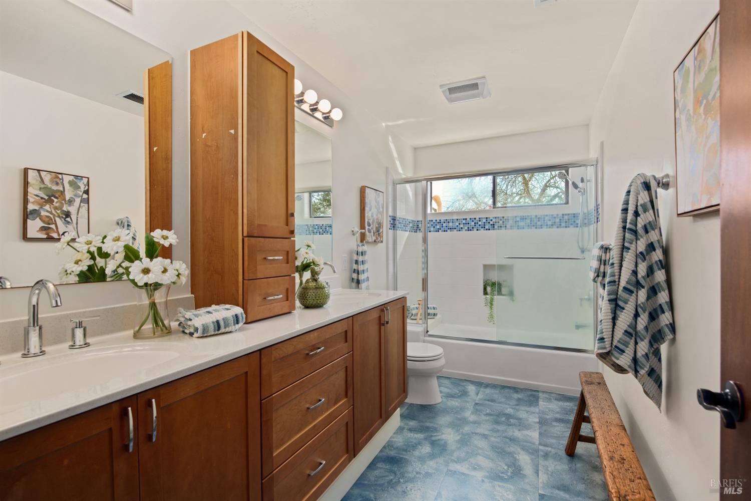 2405 Lewis Road Sebastopol, CA 95472 - Photo 50 of 58 a bathroom with a double vanity sink mirror and shower