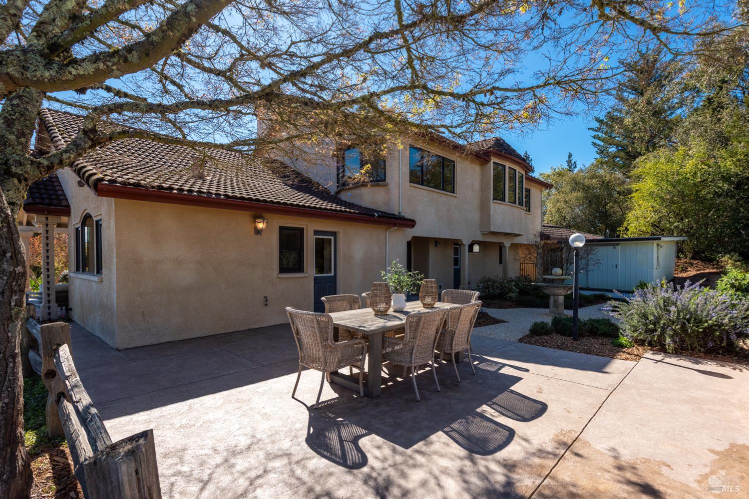 2405 Lewis Road Sebastopol, CA 95472 - Photo 58 of 58 a view of a patio with table and chairs and potted plants