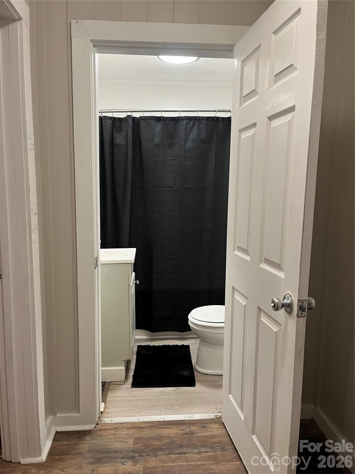 86 R And R Hyder Lane Hendersonville, NC 28792 - Photo 6 of 8 a bathroom with a sink and a toilet