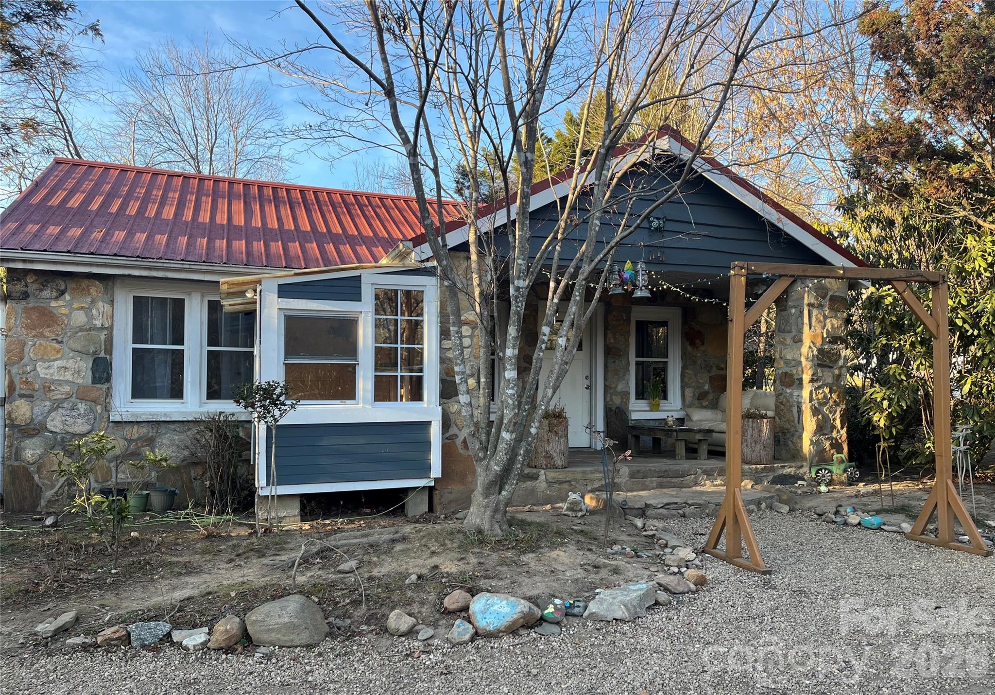 86 R And R Hyder Lane Hendersonville, NC 28792 - Photo 8 of 8 a front view of a house with garden