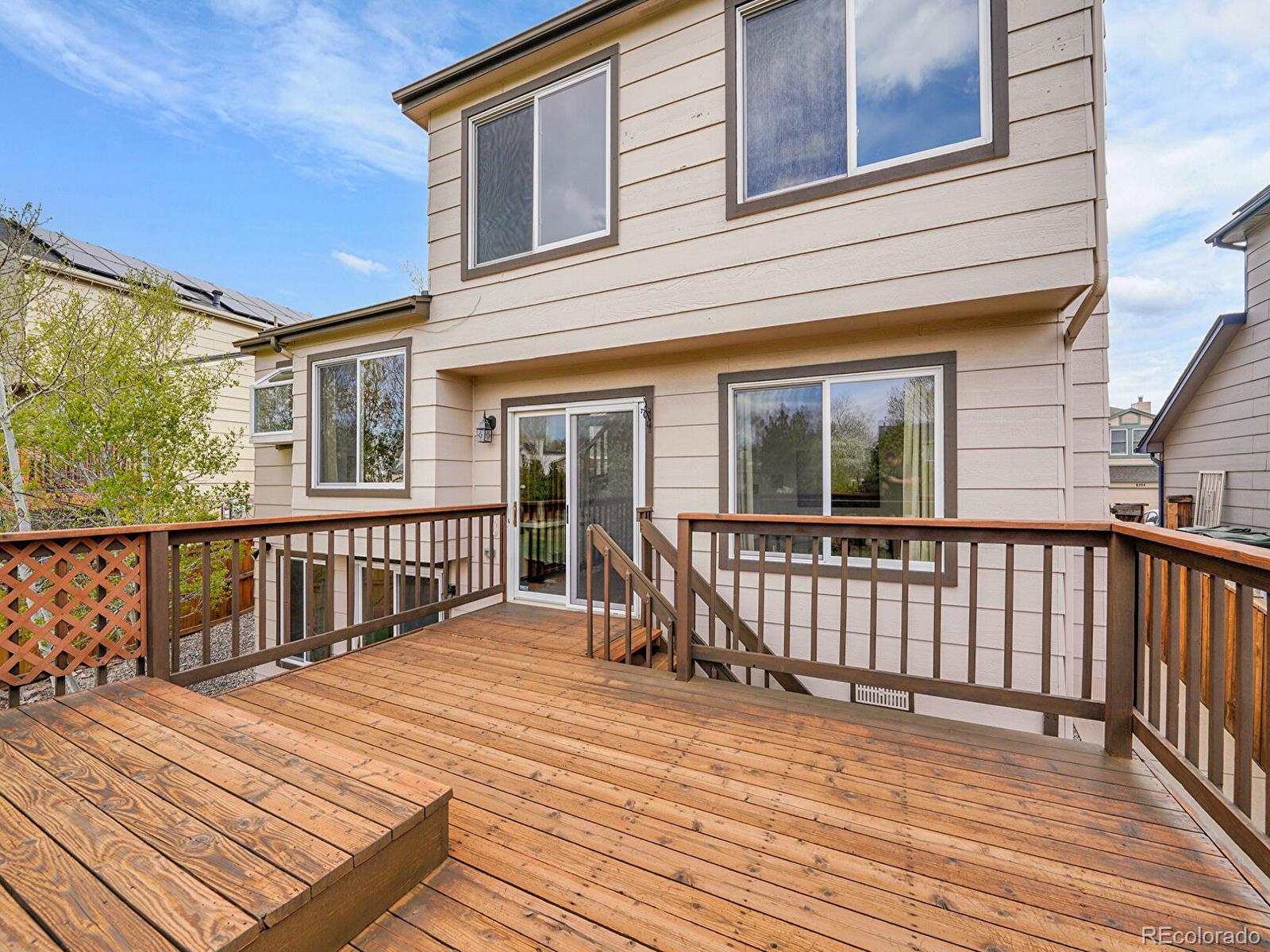 6343 Laguna Circle Highlands Ranch, CO 80130 - Photo 19 of 43 a view of a wooden deck
