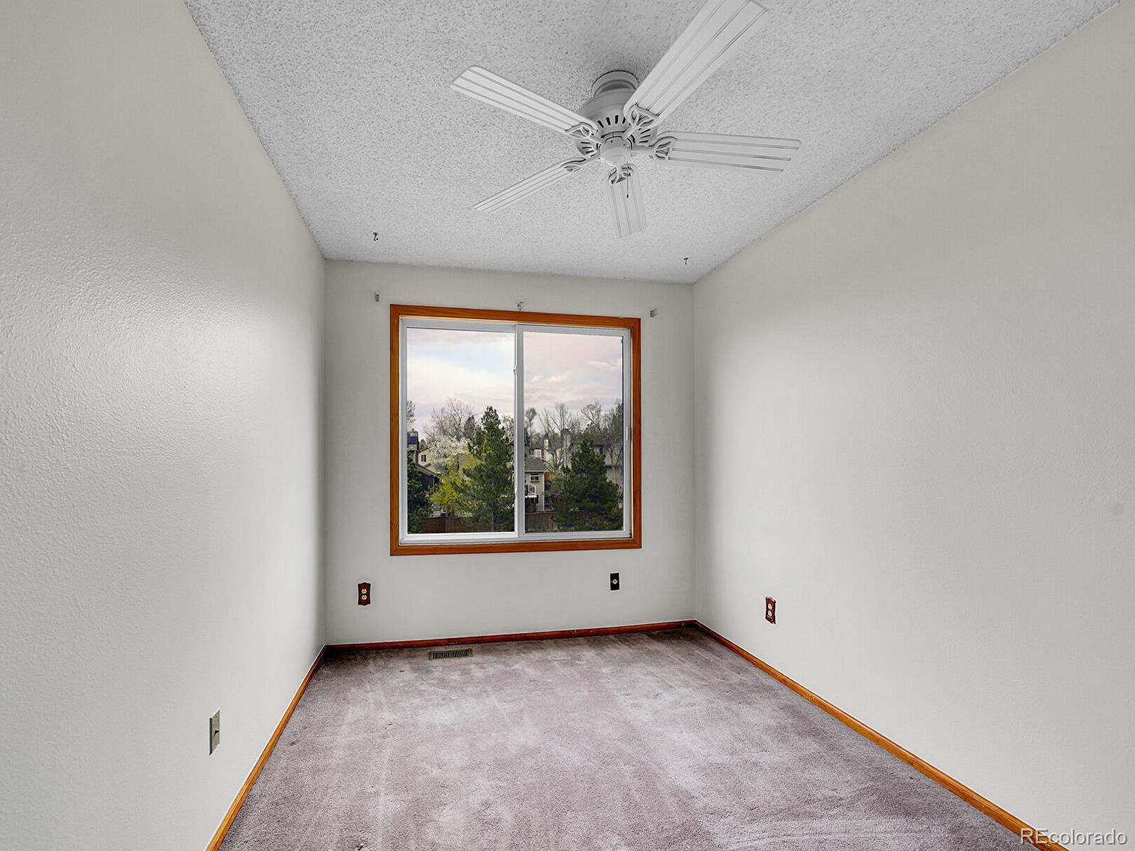 6343 Laguna Circle Highlands Ranch, CO 80130 - Photo 23 of 43 an empty room with a window