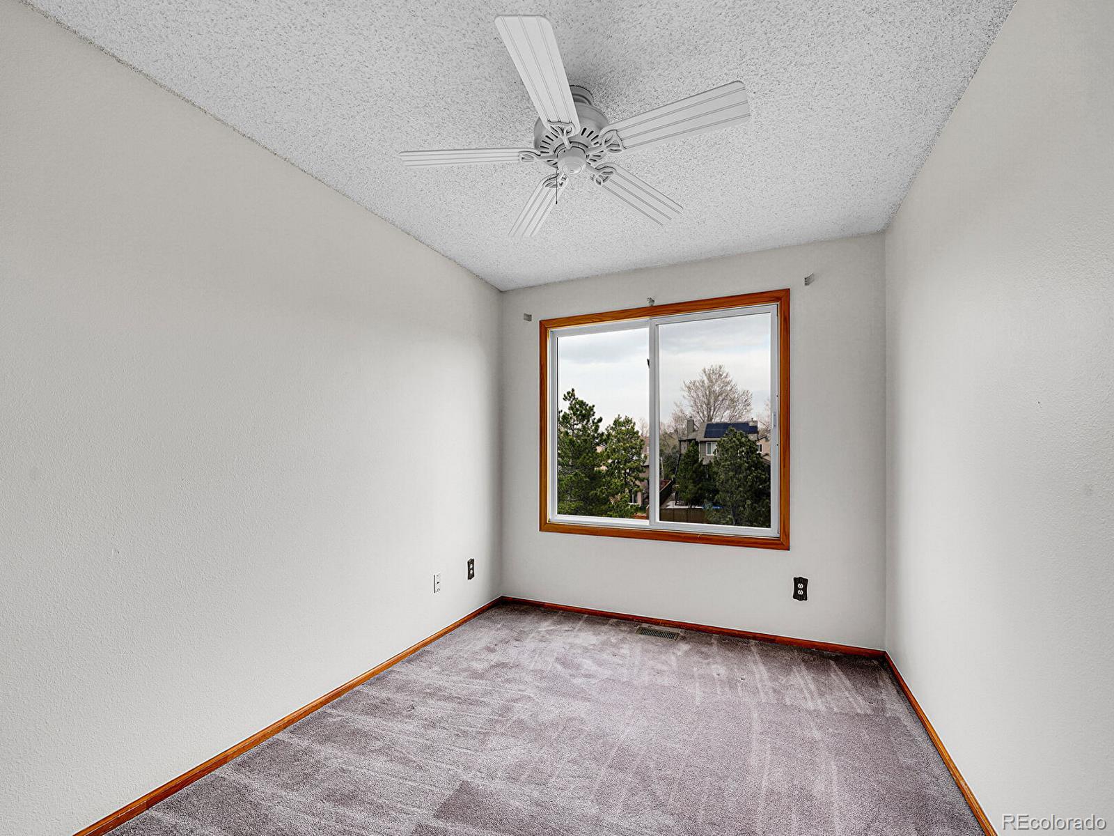 6343 Laguna Circle Highlands Ranch, CO 80130 - Photo 24 of 43 an empty room with a window