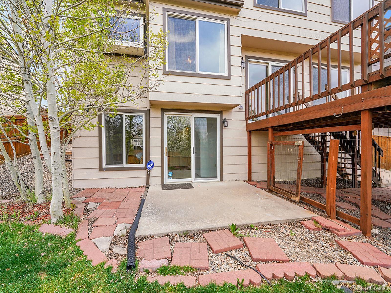6343 Laguna Circle Highlands Ranch, CO 80130 - Photo 28 of 43 front view of a house with a porch