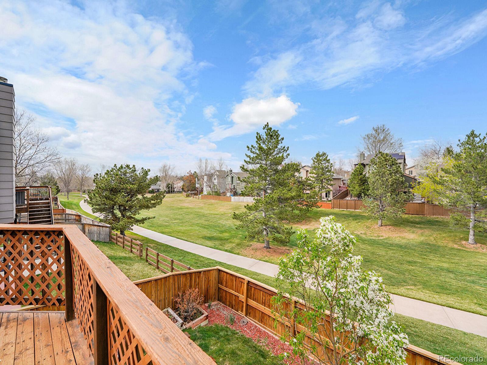 6343 Laguna Circle Highlands Ranch, CO 80130 - Photo 3 of 43 a view of swimming pool from a balcony