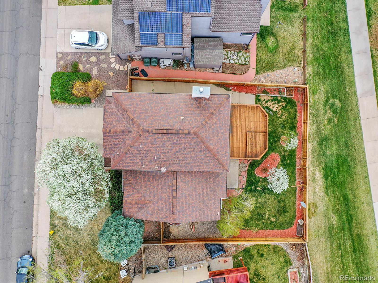 6343 Laguna Circle Highlands Ranch, CO 80130 - Photo 37 of 43 an aerial view of a house with yard swimming pool and outdoor seating