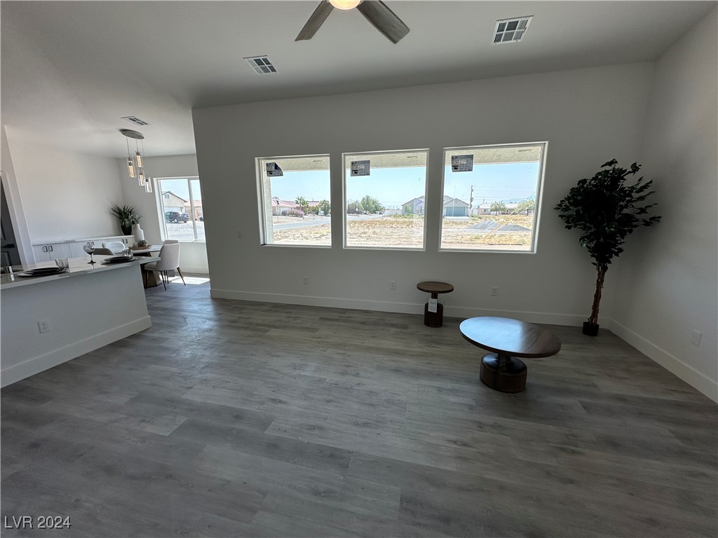 971 Jack Rabbit Street Pahrump, NV 89048 - Photo 4 of 35 Family/living room with large windows for bright and airy feeling