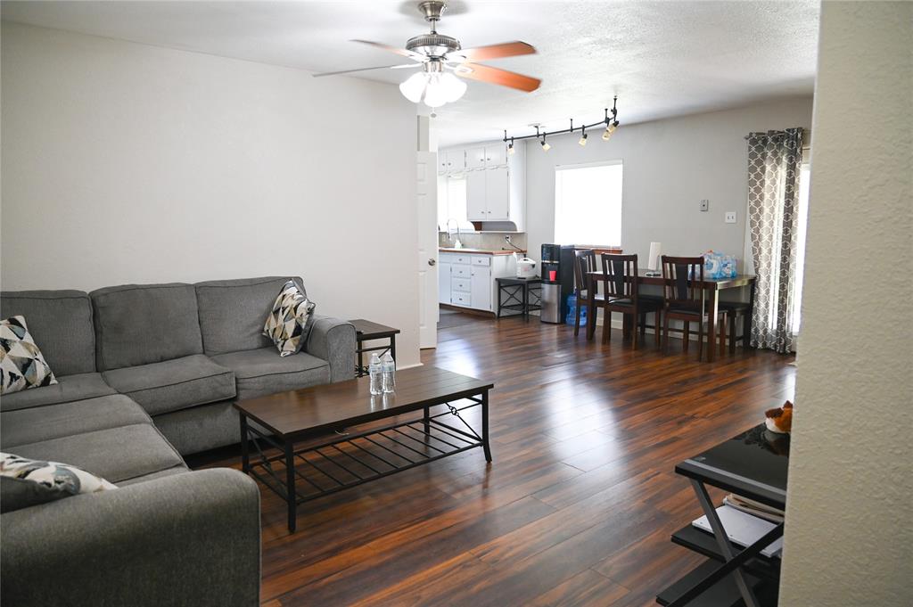 1352 Simpson Drive Hurst, TX 76053 - Photo 39 of 40 Open-concept living area featuring wood-finish flooring