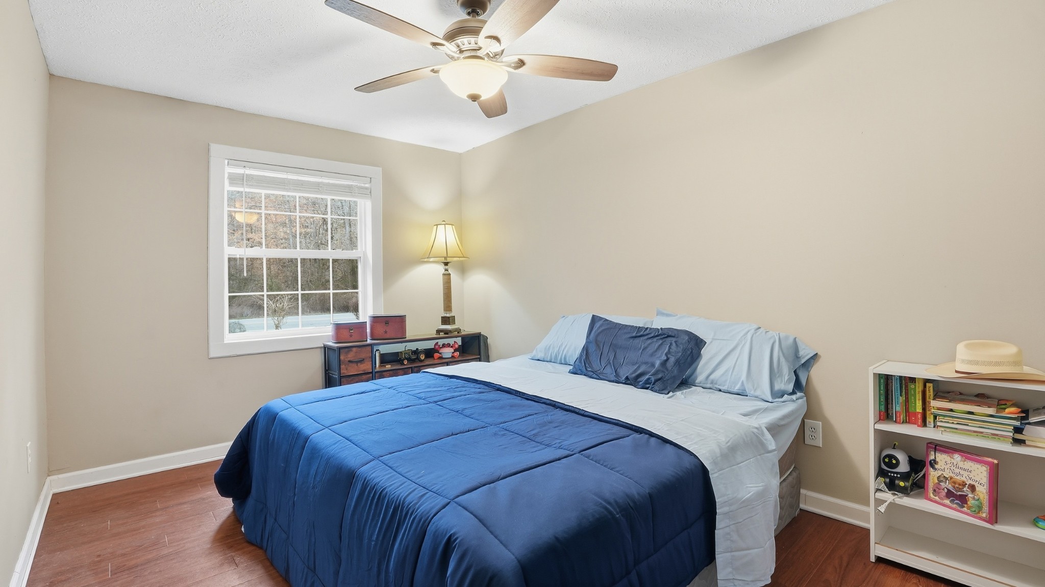 7610 Highway 50 Pelham, TN 37366 - Photo 19 of 46 a bedroom with a bed and a window