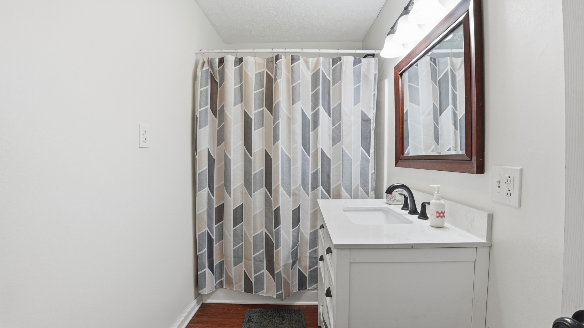 7610 Highway 50 Pelham, TN 37366 - Photo 21 of 46 a bathroom with a sink and a mirror