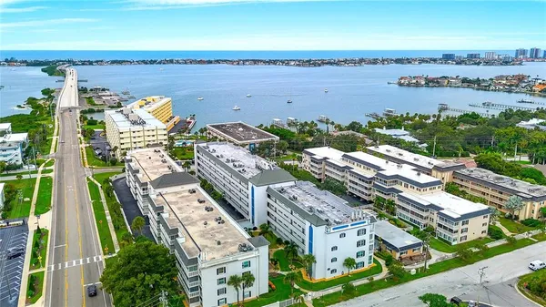 a view of a city with an ocean view