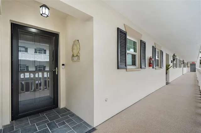 a kitchen with refrigerator and window