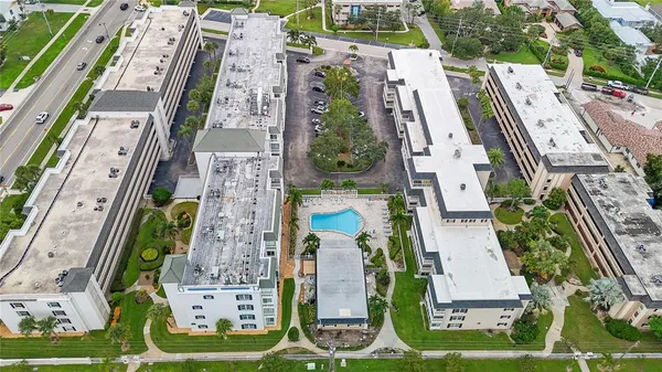 a view of a car park in front of a building