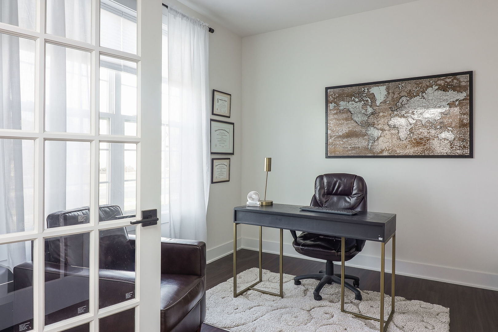 3539 Crosswater Court Elgin, IL 60124 - Photo 3 of 26 a view of a workspace with furniture and a window